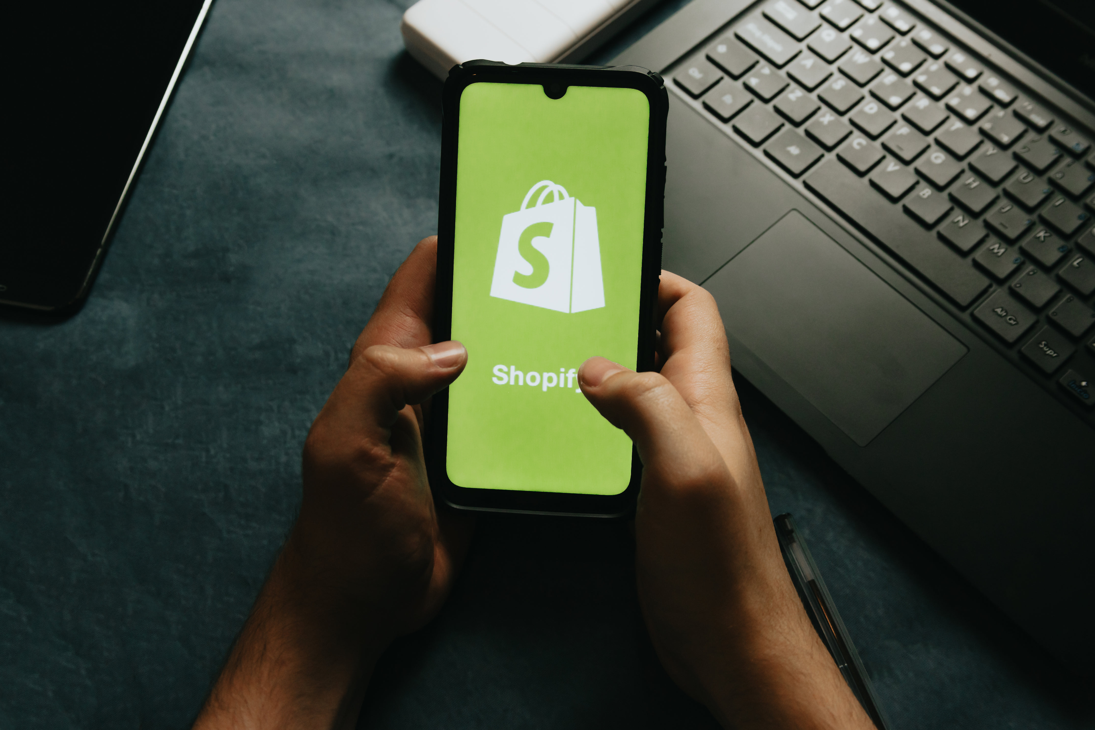 Shopify Logo on a Mobile Screen